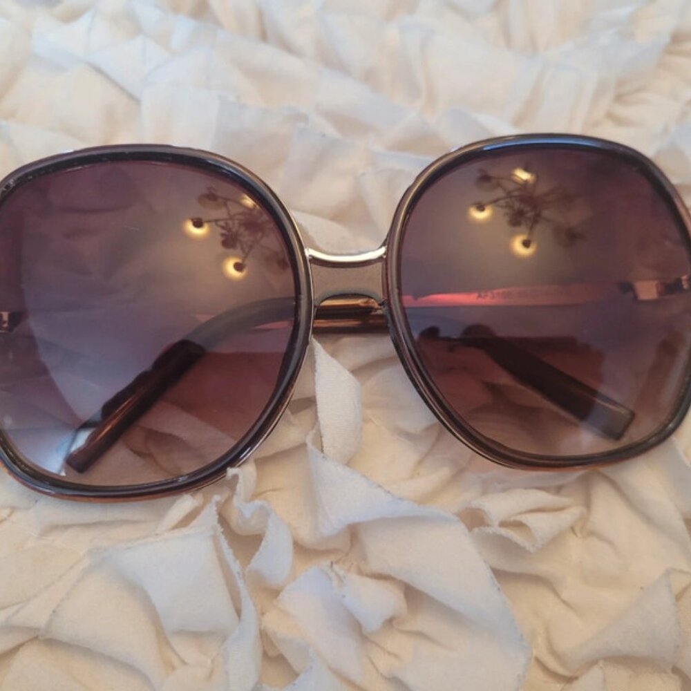 Sunglasses for women have  Couple scratches